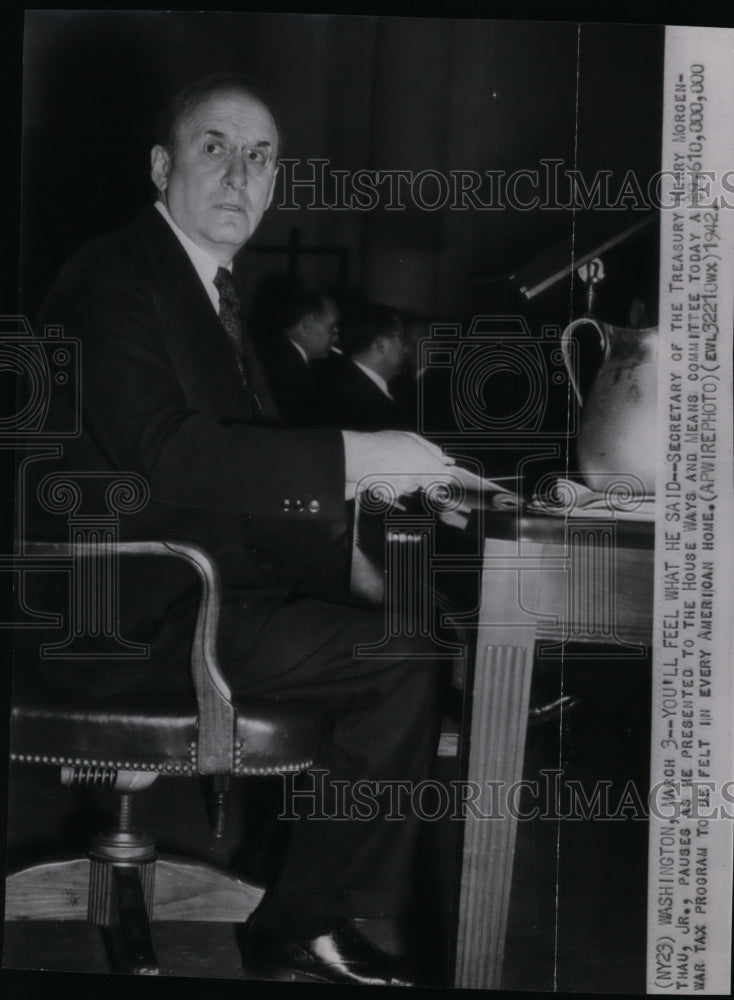 1942 Secretary of Treasury Henry Morgenthau Jr., pauses. - Historic Images