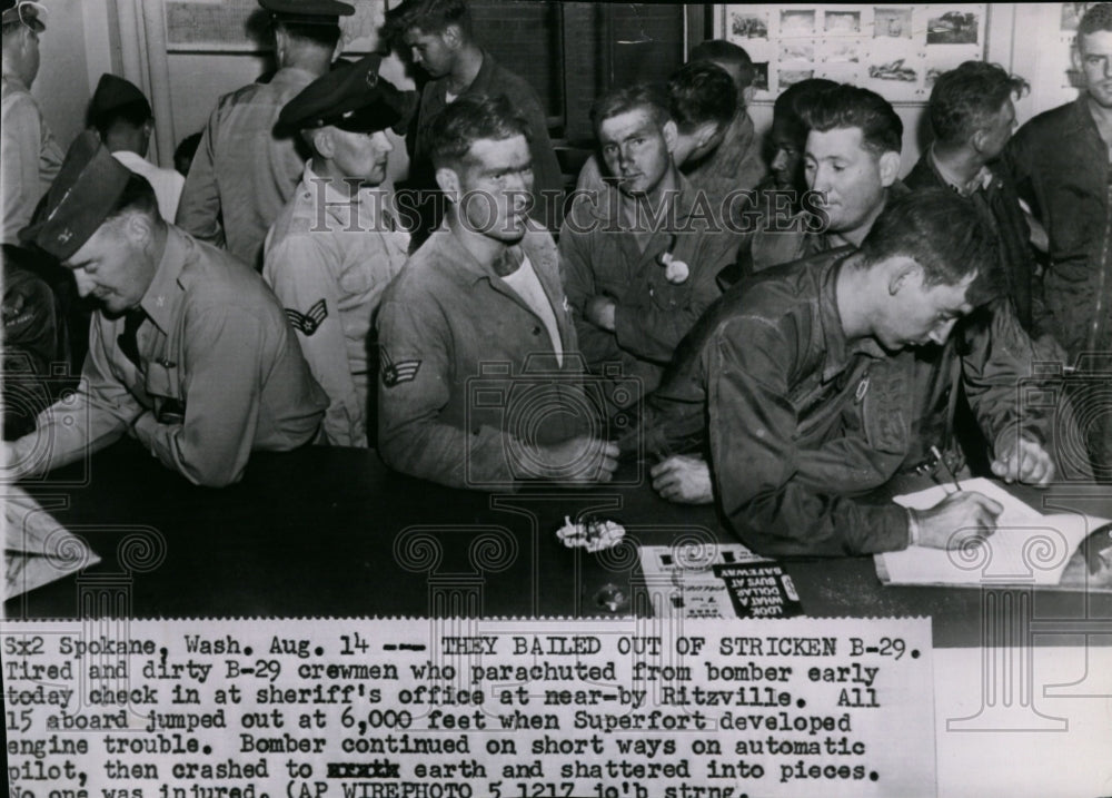 1952 B-29 airplane crew survivors lined-up at the sheriff&#39;s office - Historic Images