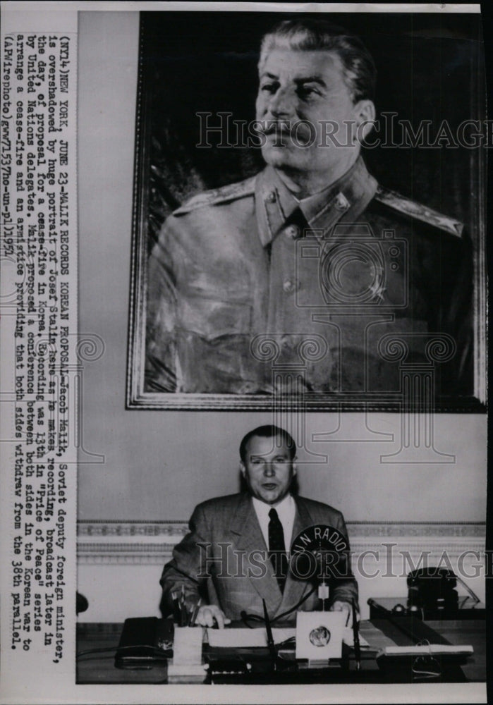 1951 Press Photo Jacob Malik, Soviet deputy foreign minister below Stalin photo - Historic Images