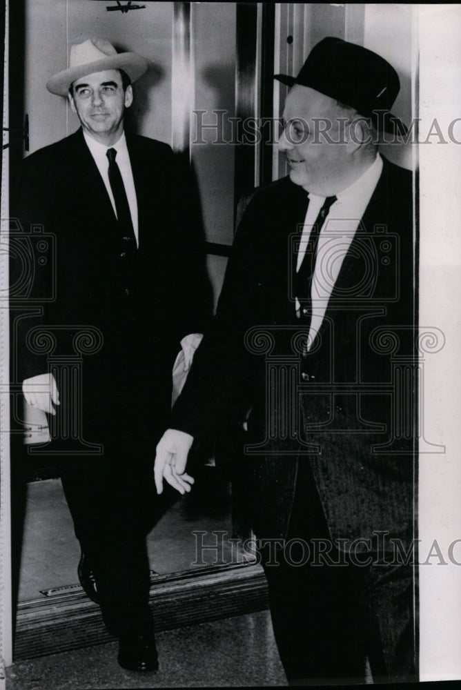 1962 Press Photo Edwin A. Walker, steps from Federal Building with U.S. Marshal. - Historic Images