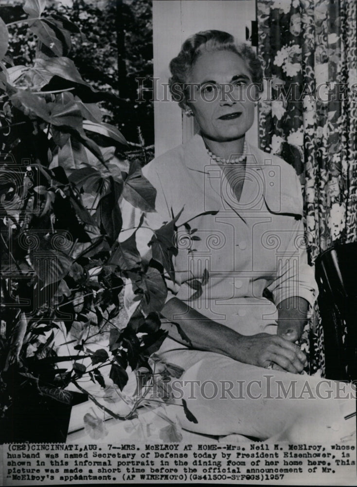 1957 Press Photo Mrs. Neil McElroy shown in the dining room of her home - Historic Images