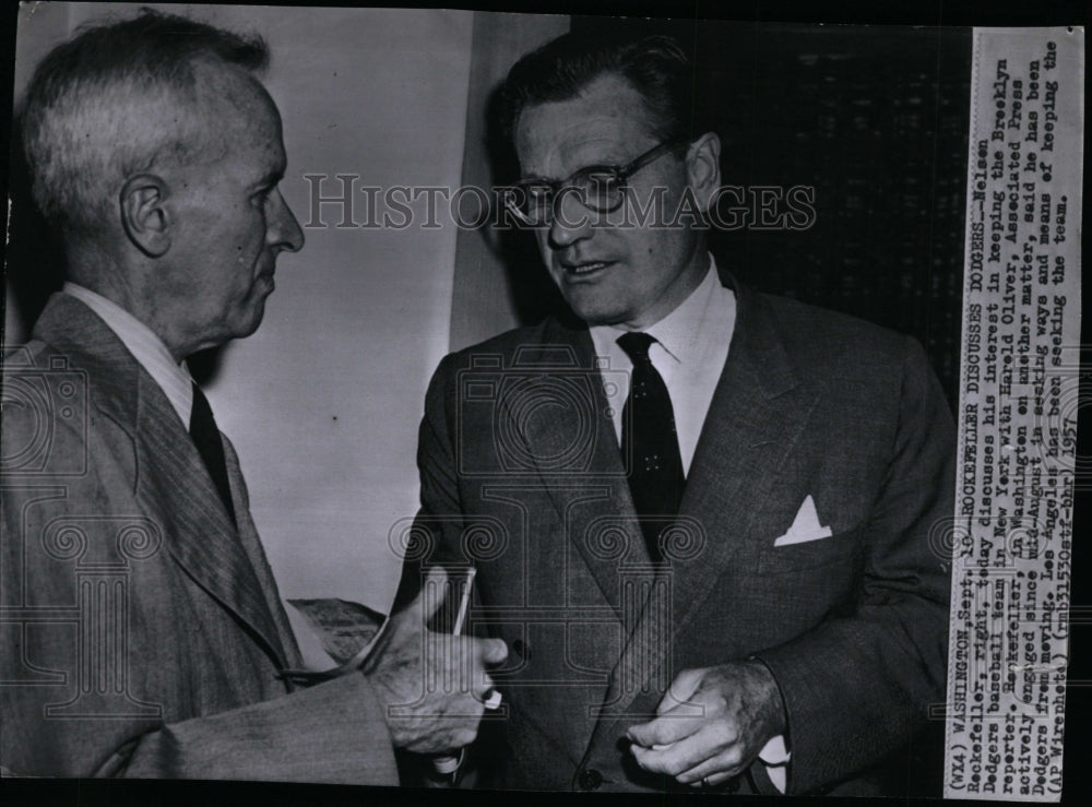 1957 Press Photo Nelson Rockefeller, talks with Harold Oliver about Dodgers. - Historic Images