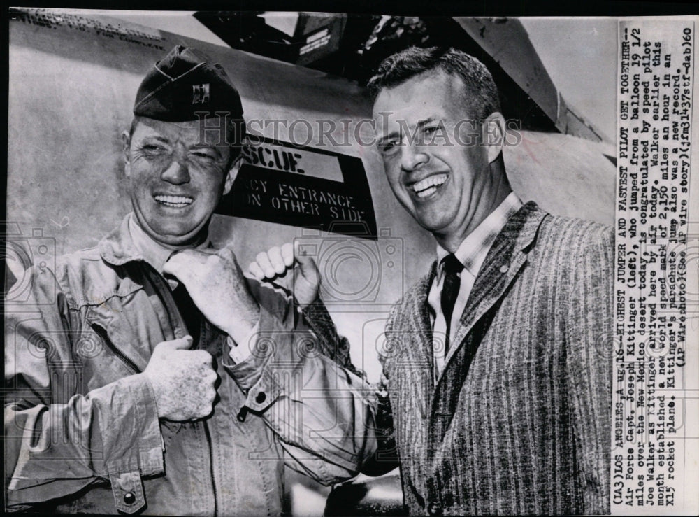 1960 Press Photo Air Force Capt. Joseph Kittinger congratulated by Pilot Walker.-Historic Images