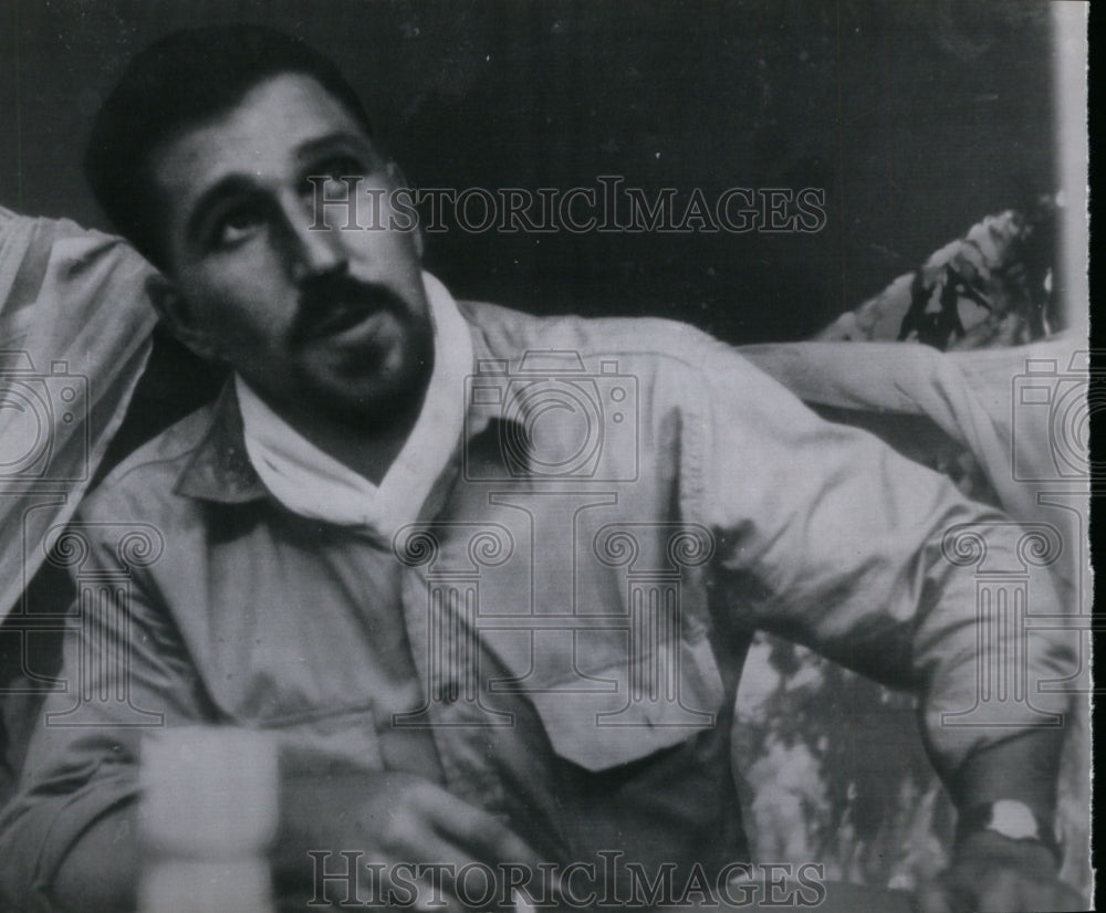 1945 Press Photo Capt. Arthur W. Wermuth, enjoys smoke shortly before peninsula. - Historic Images