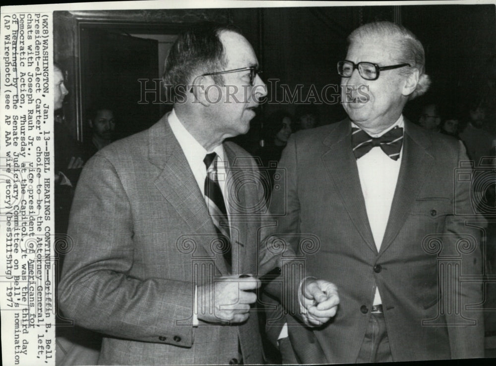 1977 Press Photo Attorney General Griffin B. Bell chats with Joseph Rauh Jr. - Historic Images