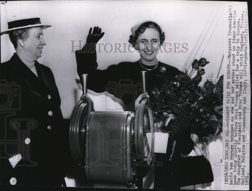 1951 Press Photo Margaret Truman, holds bon voyage bouquet on liner America. - Historic Images