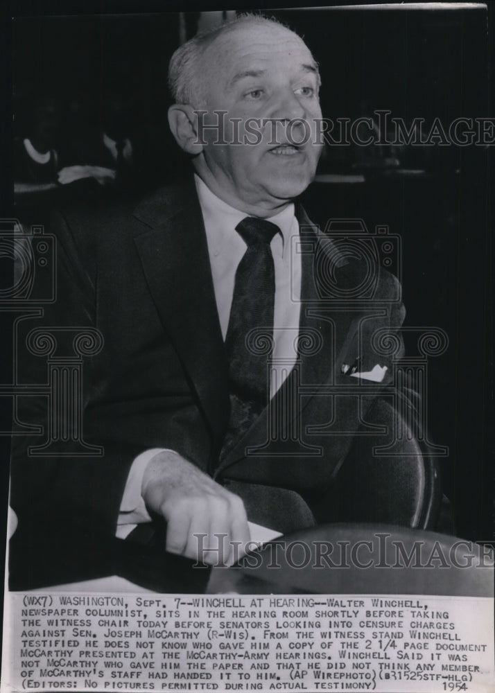 1954 Press Photo Walter Winchell, Newspaper columnist, sits in hearing room. - Historic Images