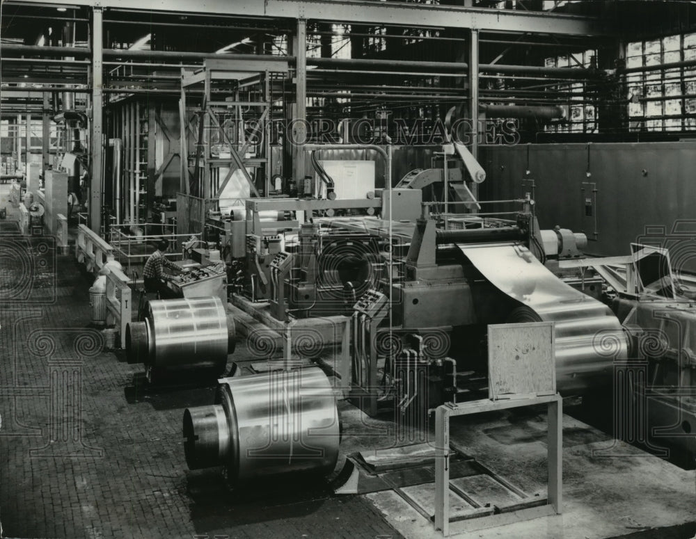 1961 Aluminum coil for can makers is processed on Kaiser facility-Historic Images