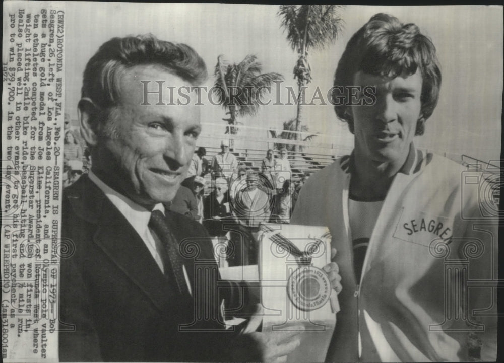1973 Pole vaulter Bob Seagren gets gold medal from Joe Kline Historic