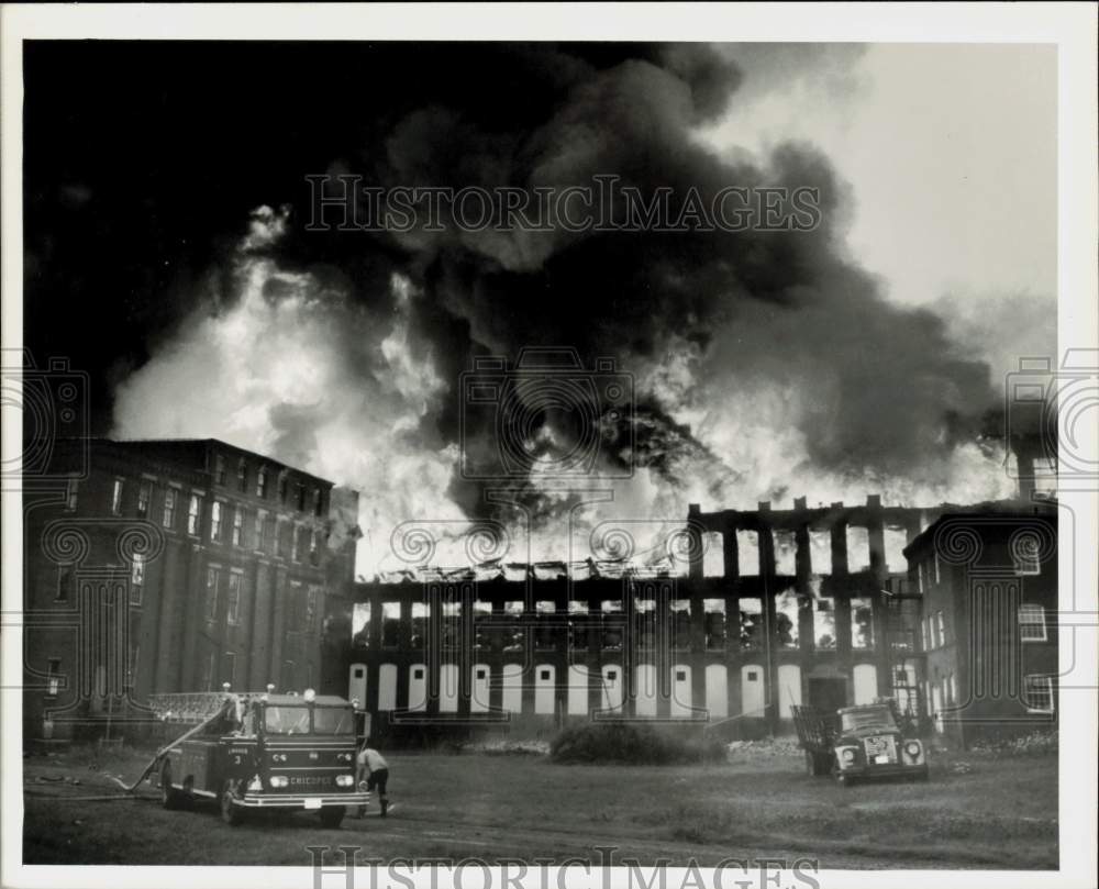 Press Photo Firemen on scene at Facemate Corporation fire. - sra22458- Historic Images