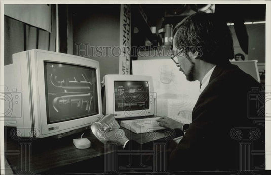 1988 Press Photo A man works on SABRE CAD/CAM system at Big E. expo. - sra38837- Historic Images