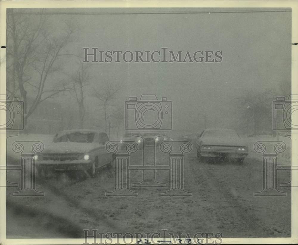 1970 Automobiles on Snow Covered James and Oak Street Traffic - Historic Images