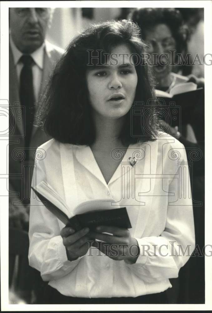 1988 Drioni Vergara Singing at Latino Presbyterian Congregation - Historic Images