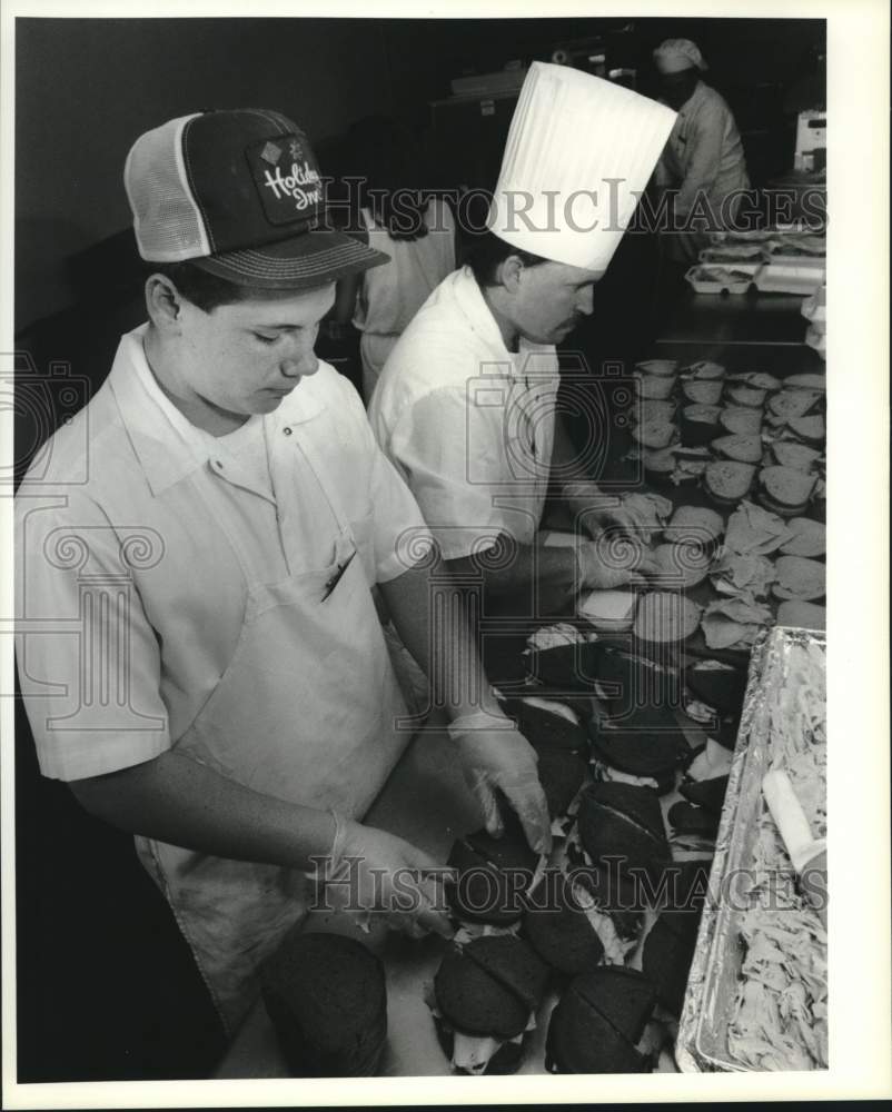 1991 Press Photo Chefs Make Senior Games Sandwiches at Holiday Inn in Liverpool - Historic Images