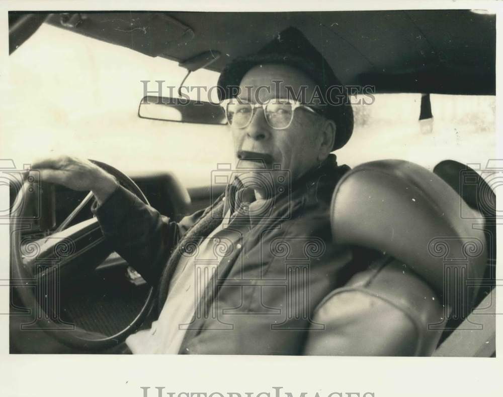 1984 Jack Cook in Car Drivers Seat - Historic Images