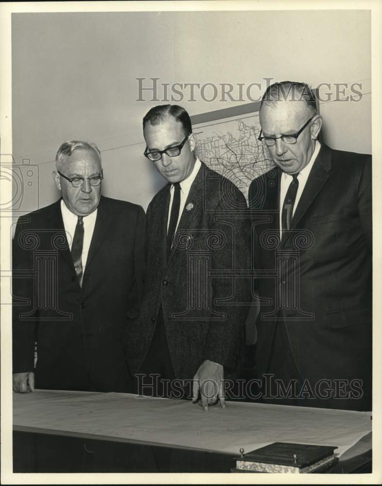 1966 New York-Men of the County Public Works Commission look at map-Historic Images