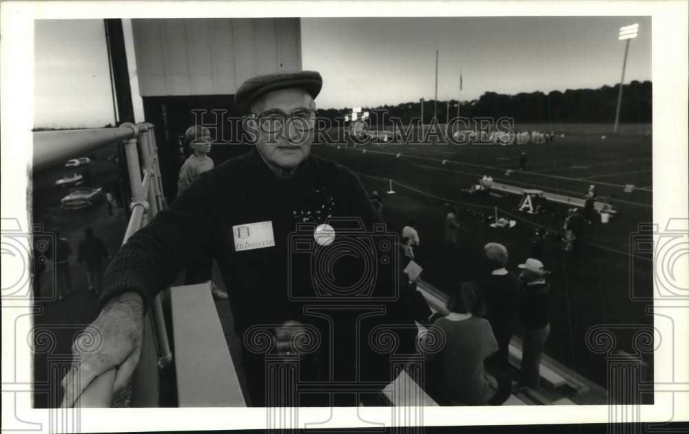 1989 Press Photo Ed Defelice in Stands at Football Game in Auburn, New York- Historic Images