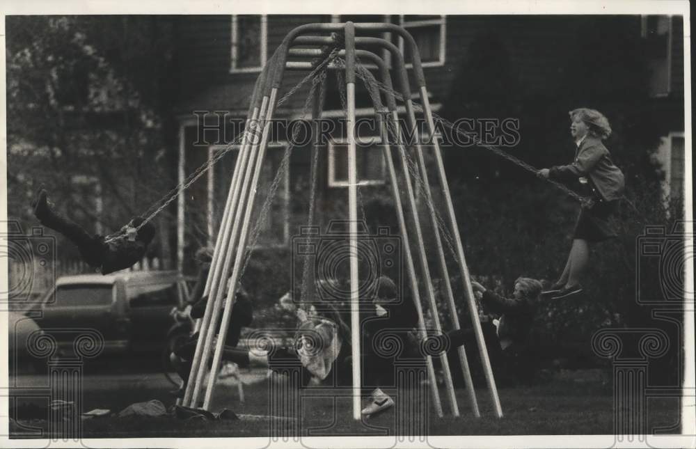 1978 Press Photo Children swing at Fulton's East Side Park, New York - sya52921- Historic Images