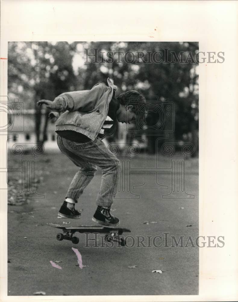 Press Photo Adam Callahan skateboards on Tamarack Street, New York - sya65933 - Historic Images