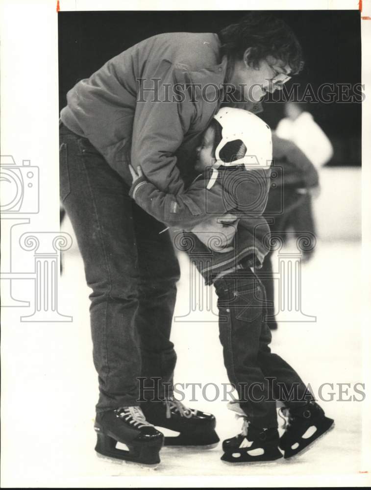 1985 Press Photo Christopher Roberts & Uncle Larry Roberts, Ice Skating at Fair- Historic Images