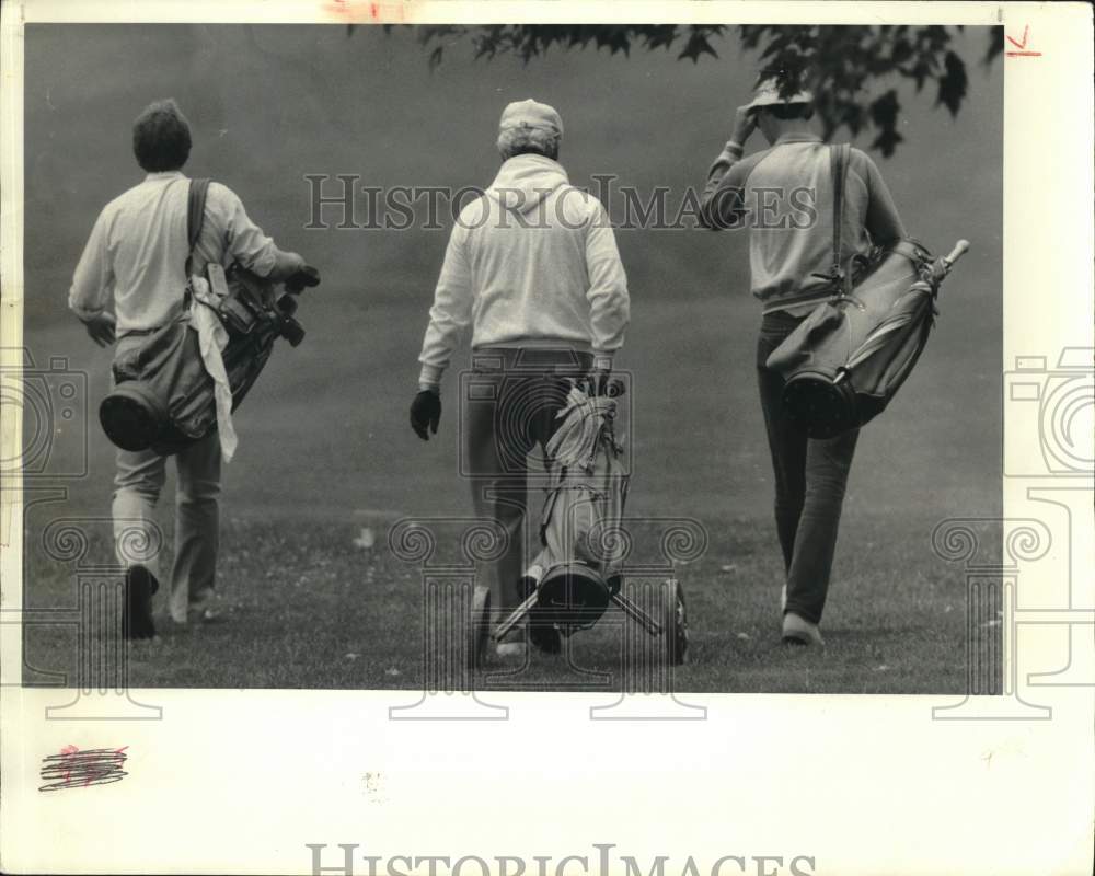 1985 Press Photo Three Golfers Walking on Course - sya86387 - Historic Images
