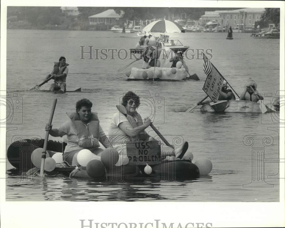 1987 Press Photo Competitors at &quot;McHarrie Days&quot; Float Race on Seneca River - Historic Images