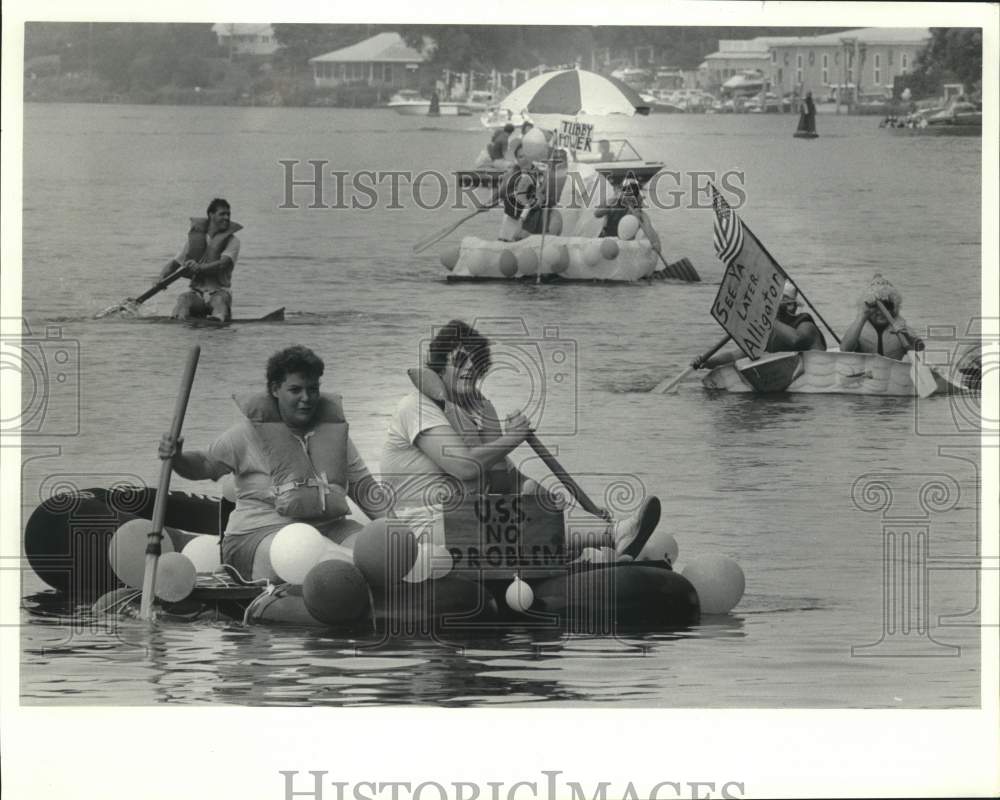 1987 Press Photo Competitors at "McHarrie Days" Float Race on Seneca River - Historic Images