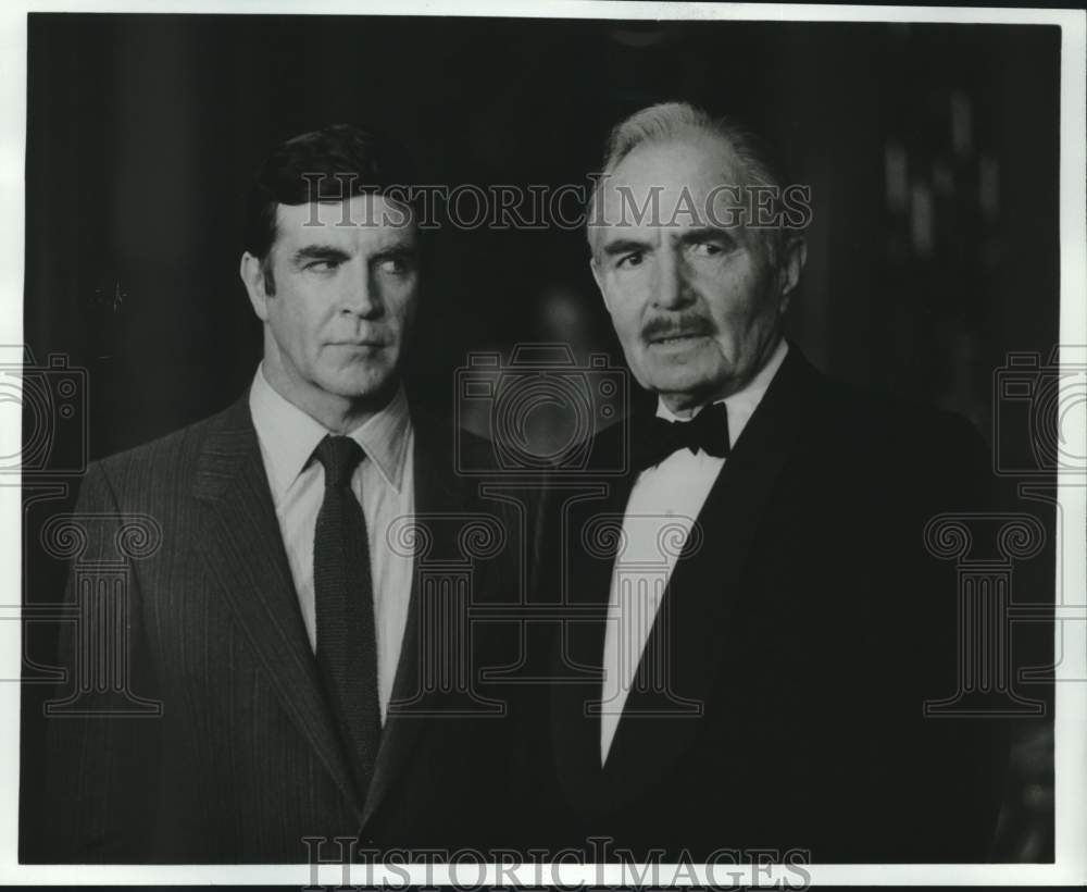 Press Photo Alan Bates and James Mason appear in "Dr. Fischer of Geneva" - Historic Images