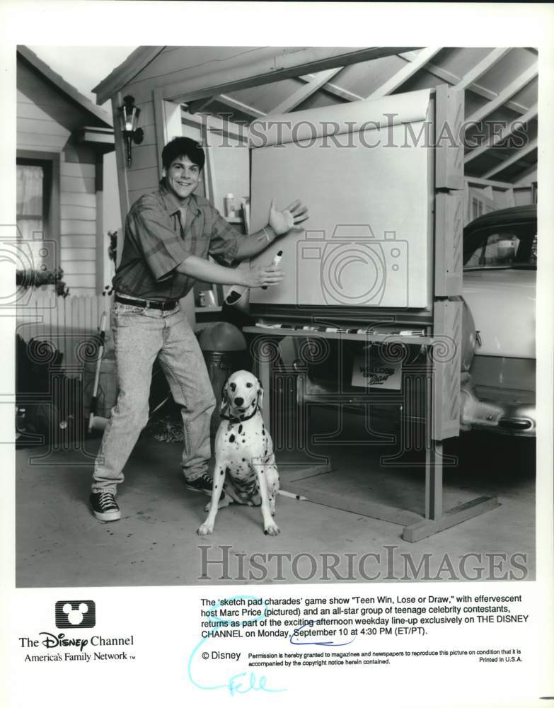 Press Photo Marc Price, host of &quot;Teen Win, Lose or Draw&quot; with a dog - Historic Images