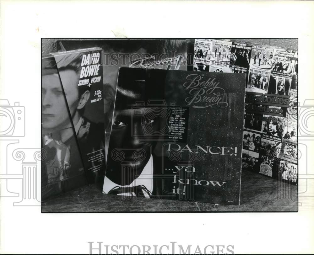 1989 Press Photo Musical Artist Bobby Brown Record and David Bowie - syp27378 - Historic Images