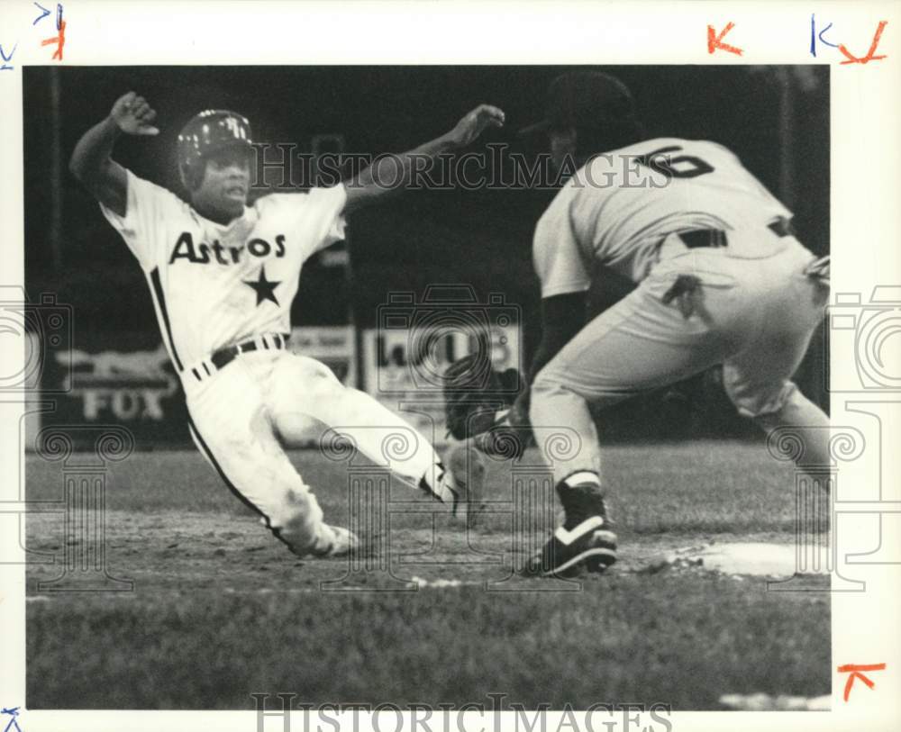 1991 Press Photo Astros Baseball Player James Mouton slides at Falcon Park- Historic Images