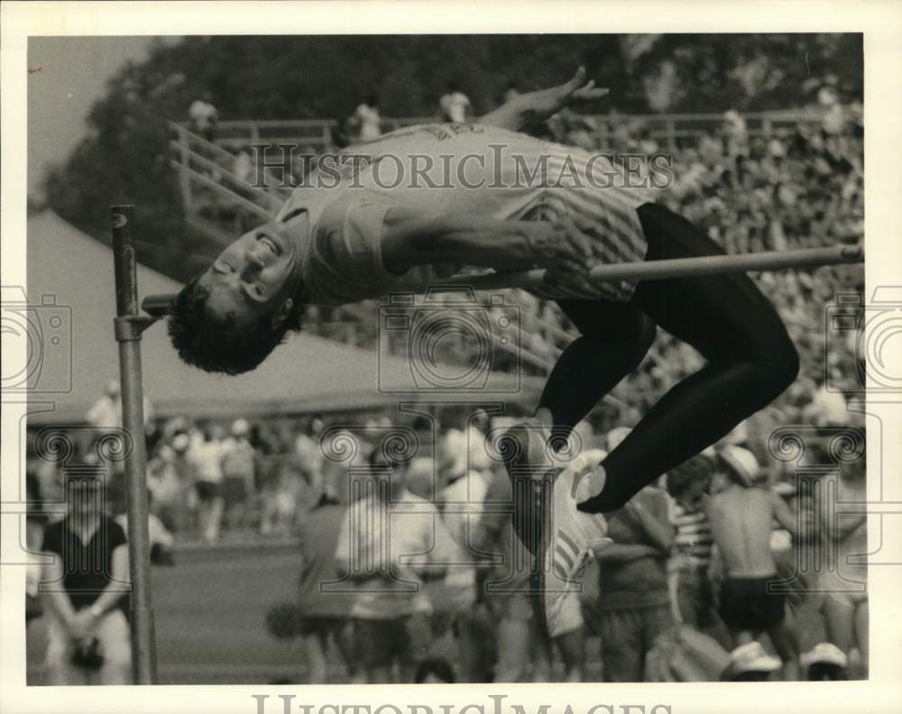 1984 Press Photo Marty Charles During High Jump - sys07887 - Historic Images