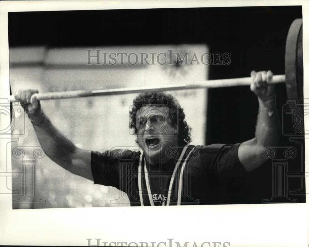 1987 Press Photo Weightlifter Brian Drescher lifts 132.5 KG during Empire Games - Historic Images
