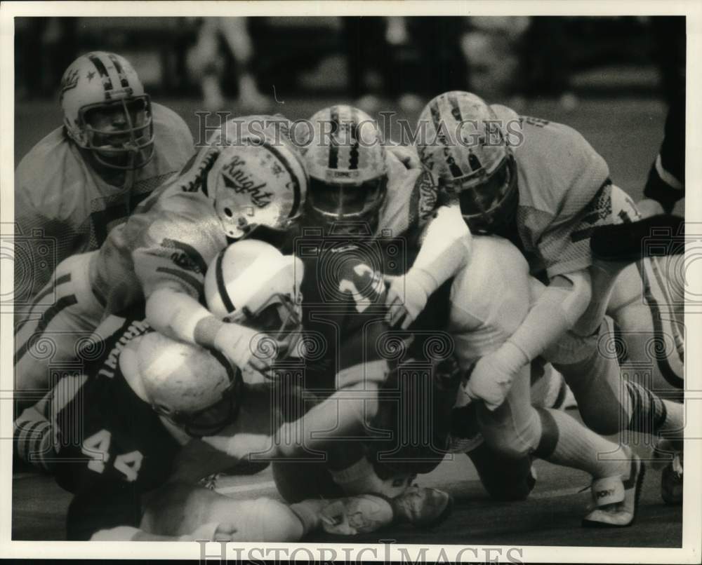 1983 Press Photo Homer Football Player Tim Cottrell at Game Tackle - sys07988- Historic Images