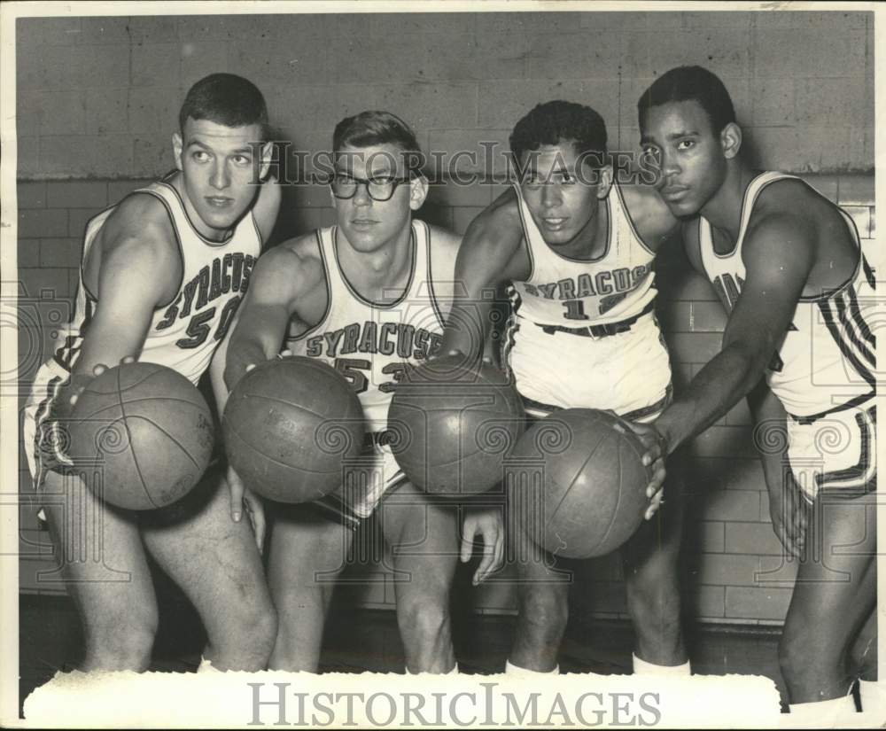 1960 Press Photo Syracuse University basketball players hold out basketballs- Historic Images