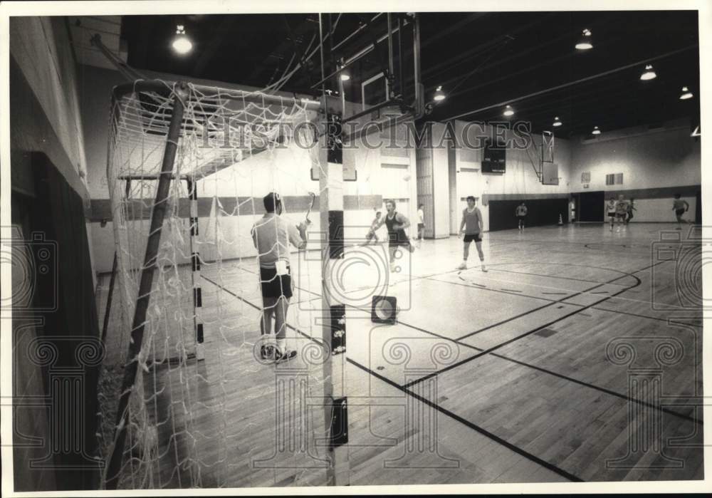 Press Photo Don Ciciriillo, behind net, coaches Empire Games team handball squad- Historic Images