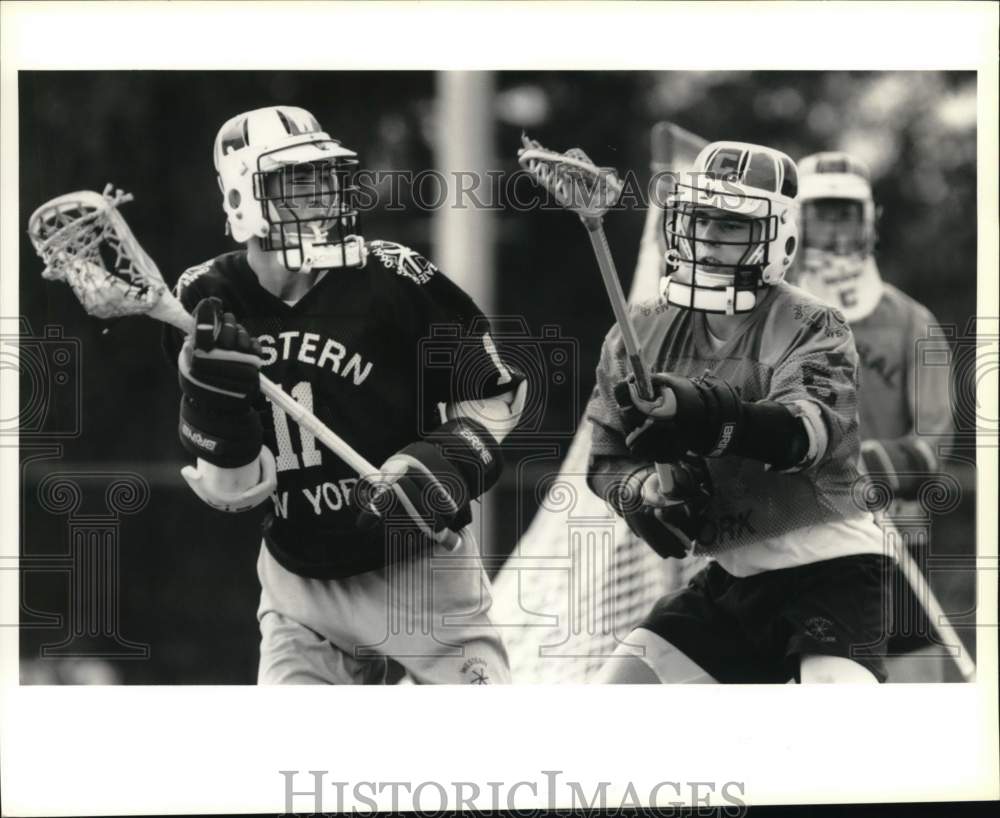 1990 Press Photo Central lacrosse player Scott Dattellas blocks Rob Knapp at ESG - Historic Images