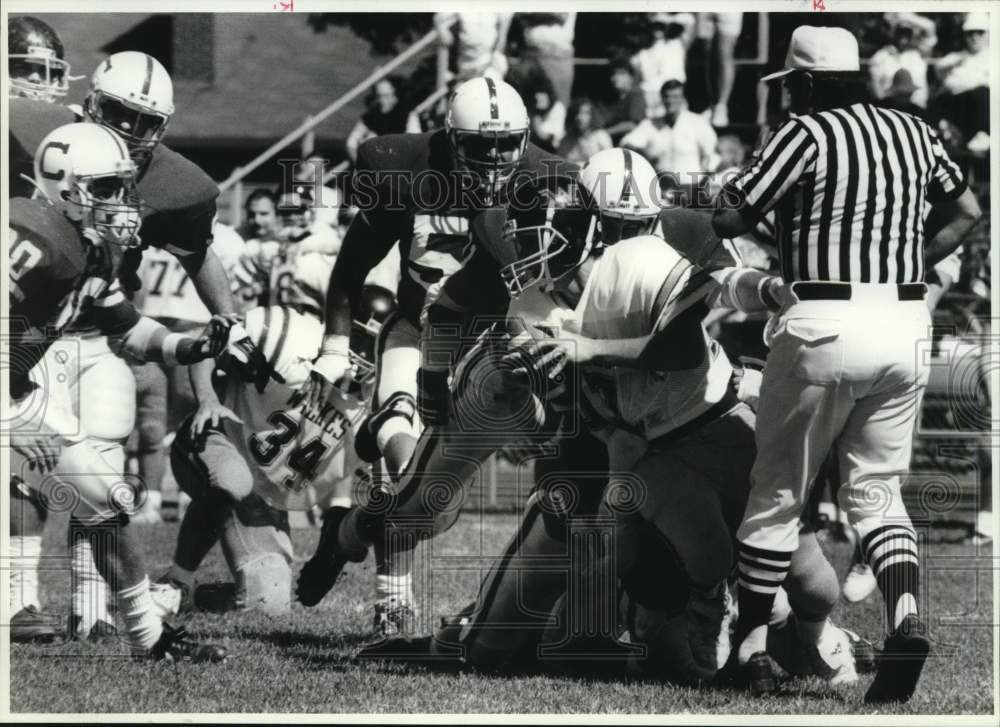 1990 Press Photo Wilks University football quarterback Louis Emmanuel is sacked- Historic Images