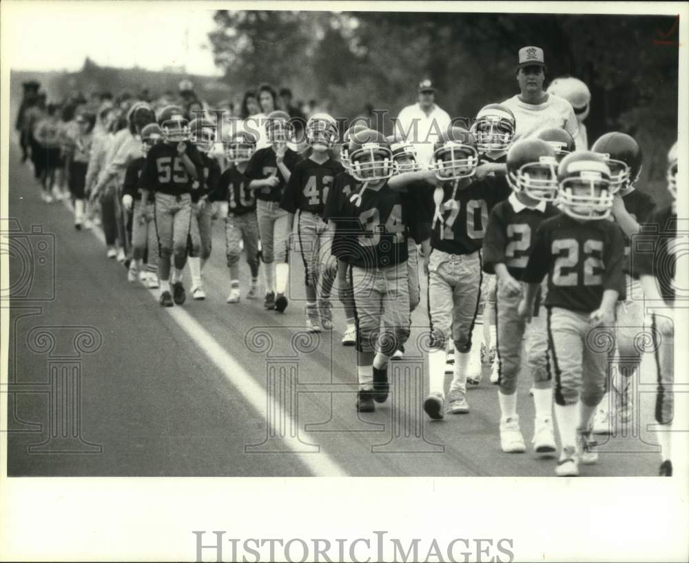 1988 Press Photo Clay Panthers Football League Junior Midgets march in parade - Historic Images