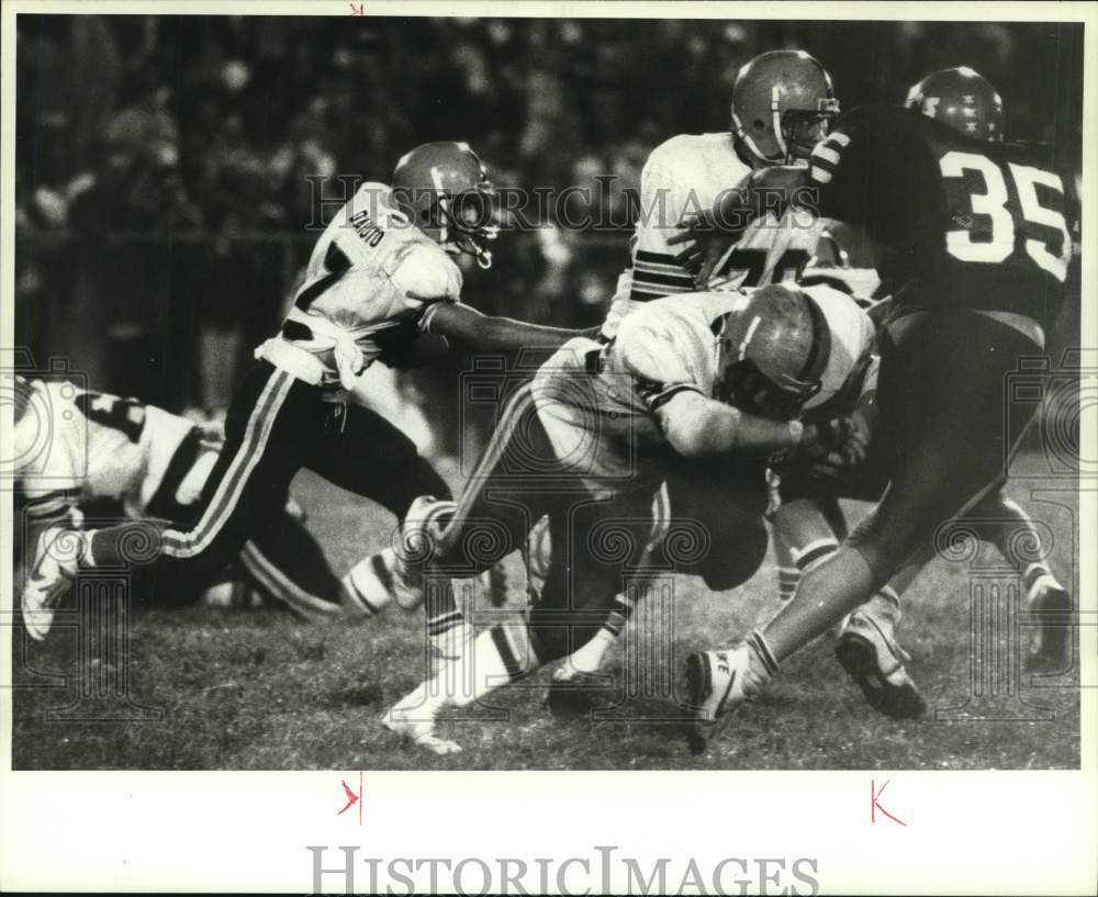 1988 Press Photo Rome Free Academy football offensive players run play in game- Historic Images