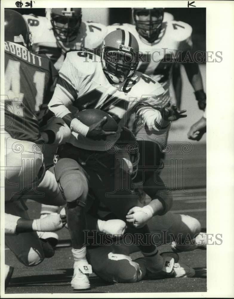 1984 Press Photo Syracuse University football running back Jaime Covington runs - Historic Images