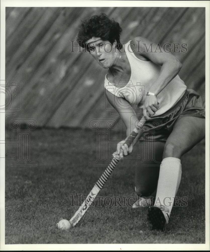 Press Photo Empire State Games field hockey player Deb Fiore hits the ball - Historic Images