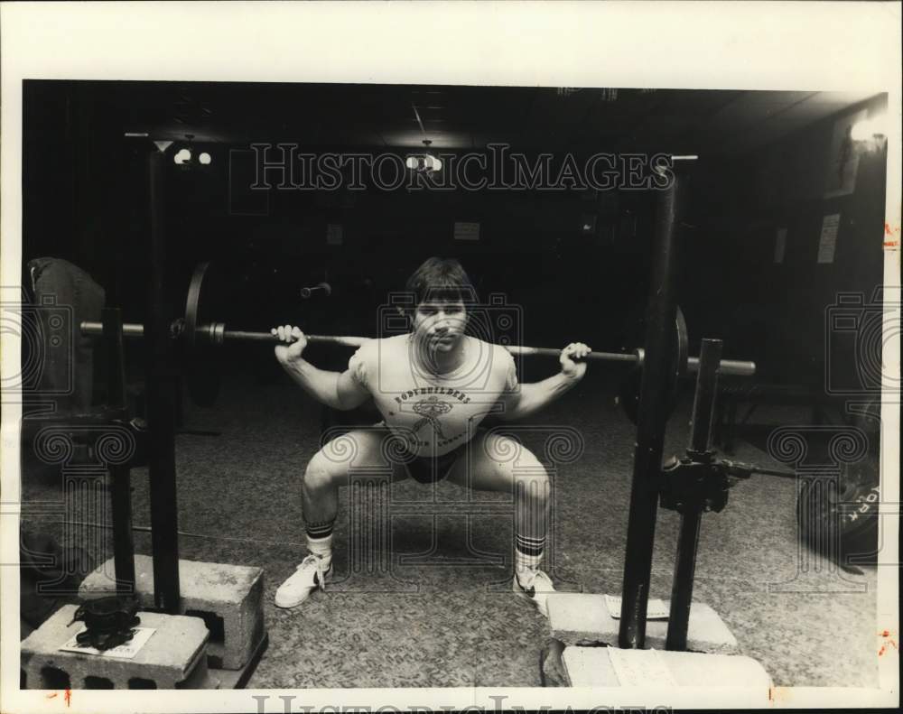Press Photo Weightlifter at Squat Rack - Historic Images