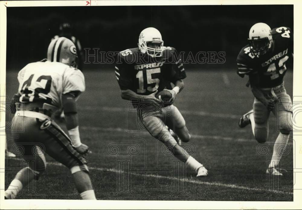 1988 Press Photo Syracuse Express and Greenjackets Football Players at Game - Historic Images