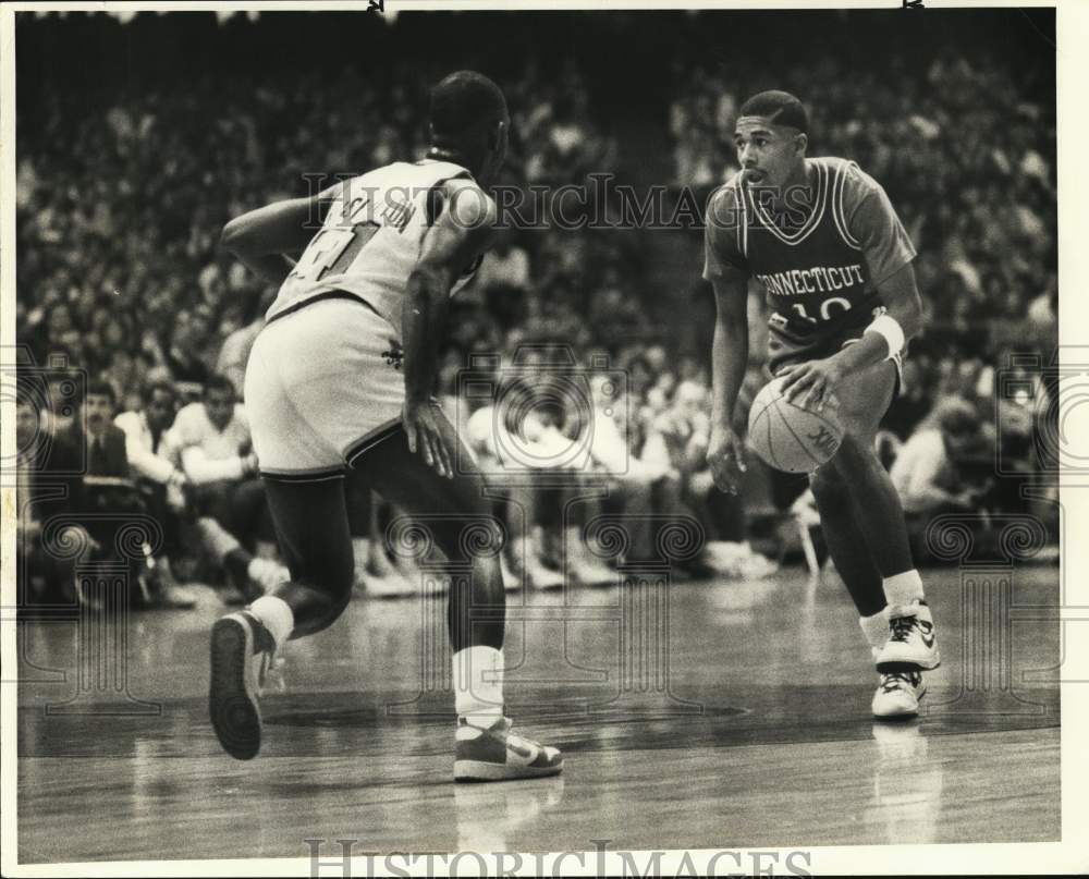 1986 Press Photo Basketball Players Earl Kelley and Dwayne Washington at Game- Historic Images