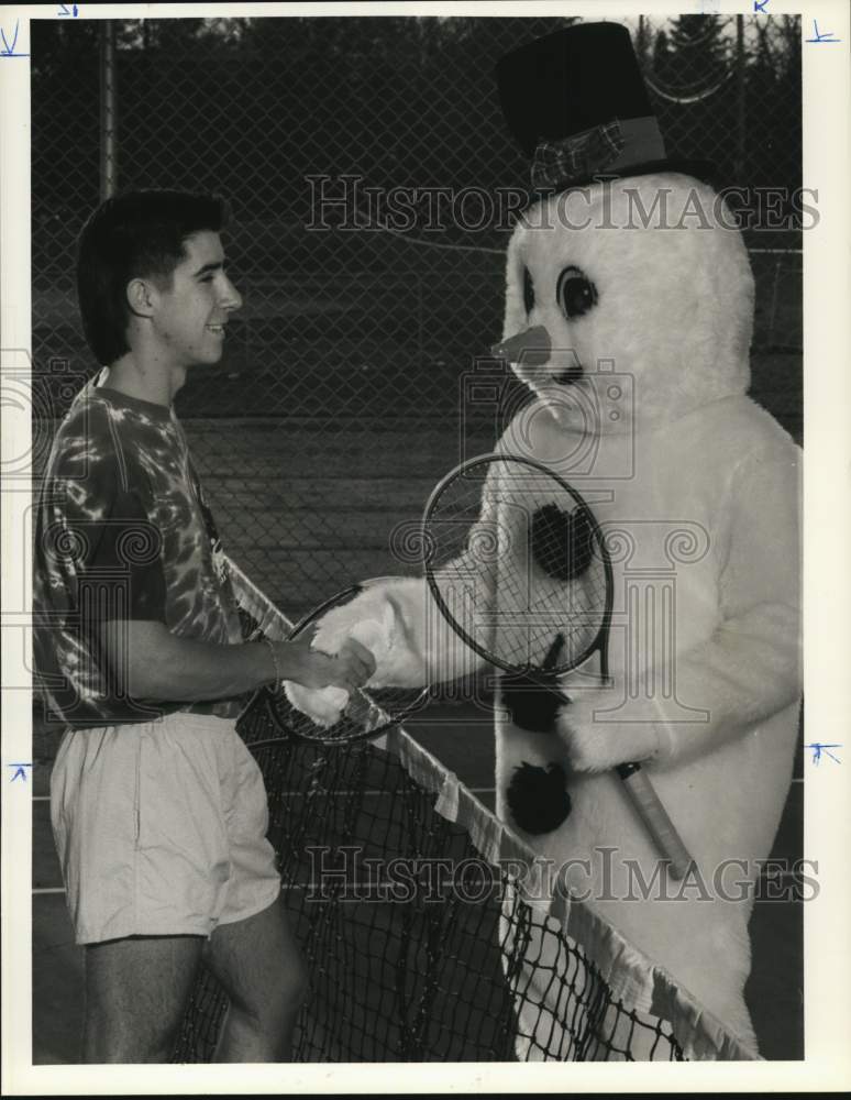 1990 Press Photo Jamesville-DeWitt Tennis Player Dax Vlassis with Snowman- Historic Images