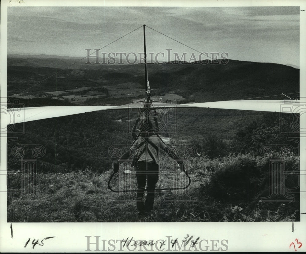 1977 Hang glider preparing to take flight-Historic Images