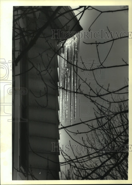 1994 Icicles hang from building in Wynanskill, New York - Historic Images