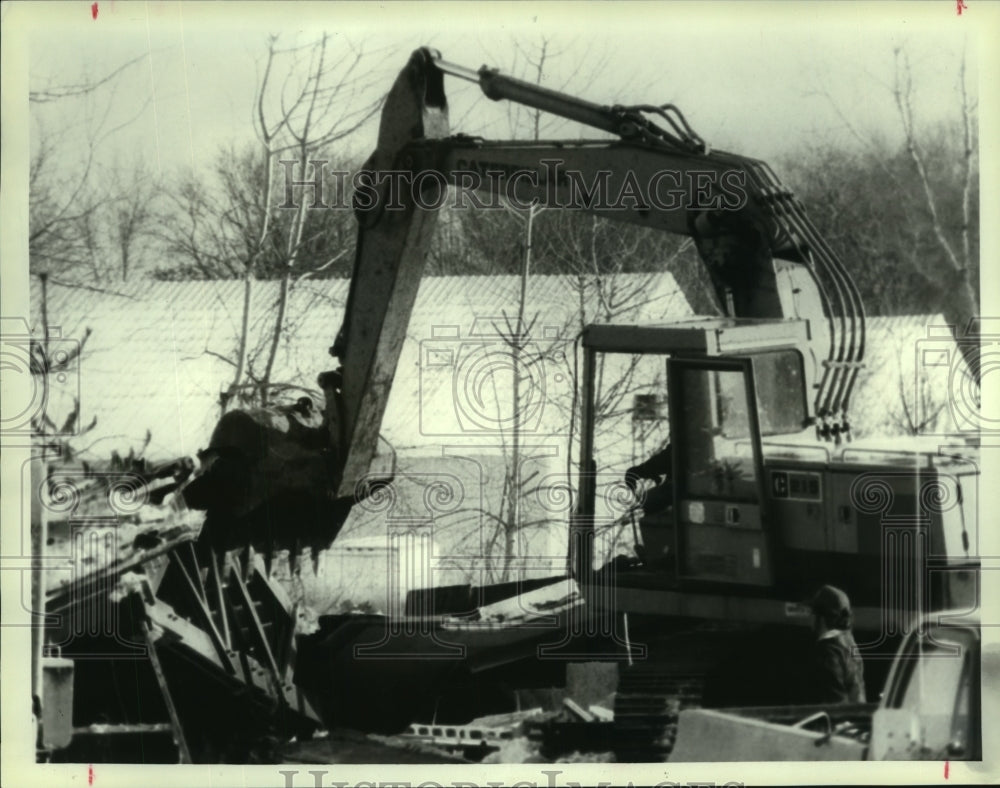 1990 Crew demolishes building on Wolf Road in Albany, New York - Historic Images