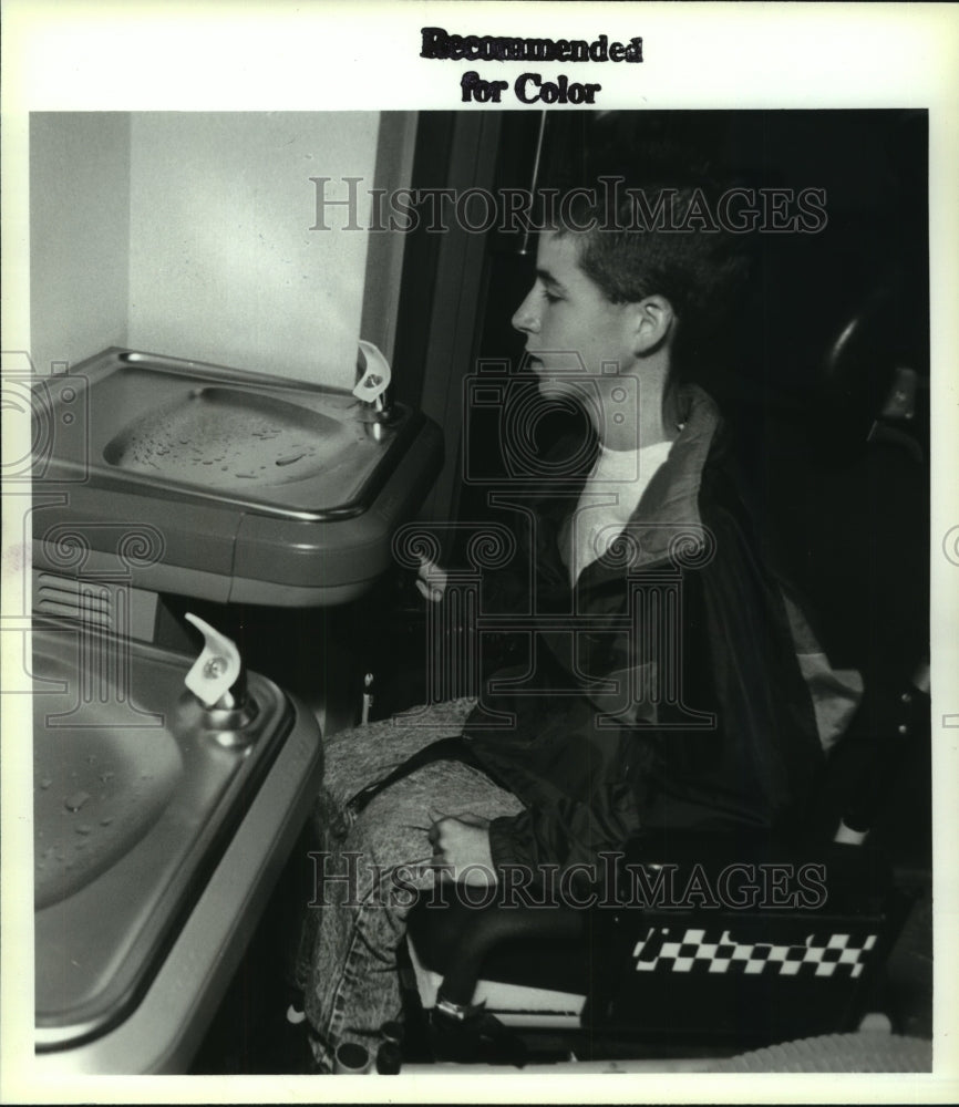 1992 Press Photo Dan Boyce at handicapped accessible water fountain, Albany, NY - Historic Images